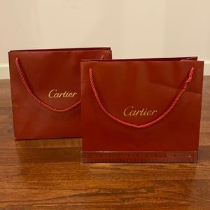 Two Cartier Shopping Bags